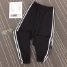 Pantaloni negri trening cu dungi albe